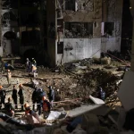 Iran Missiles Hit Areas Near Israel Nuclear Site, Over 100 Hurt